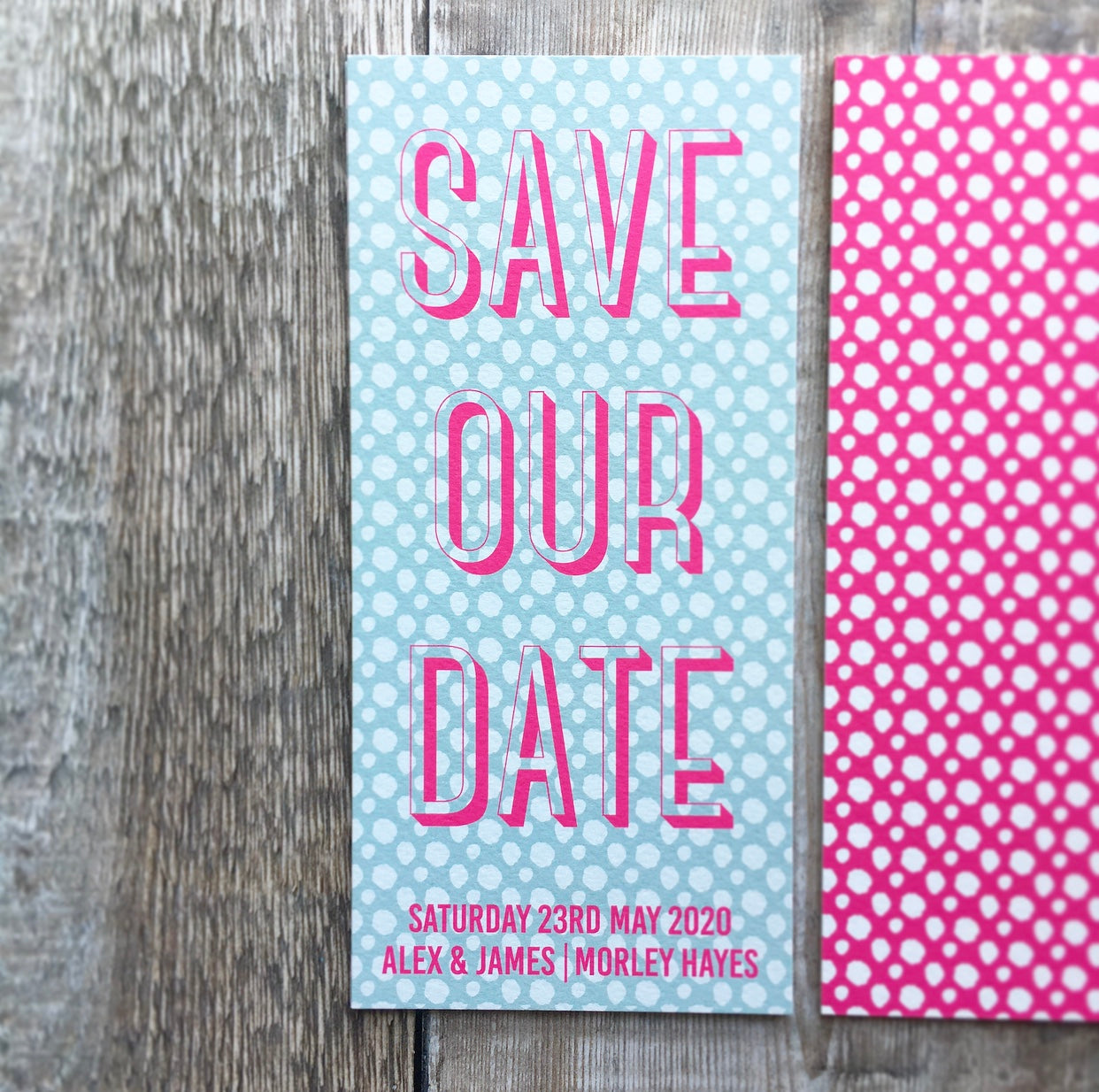 Close up view of the front. Bookmark-style wedding invitation/save the date. 99mm x 210mm.