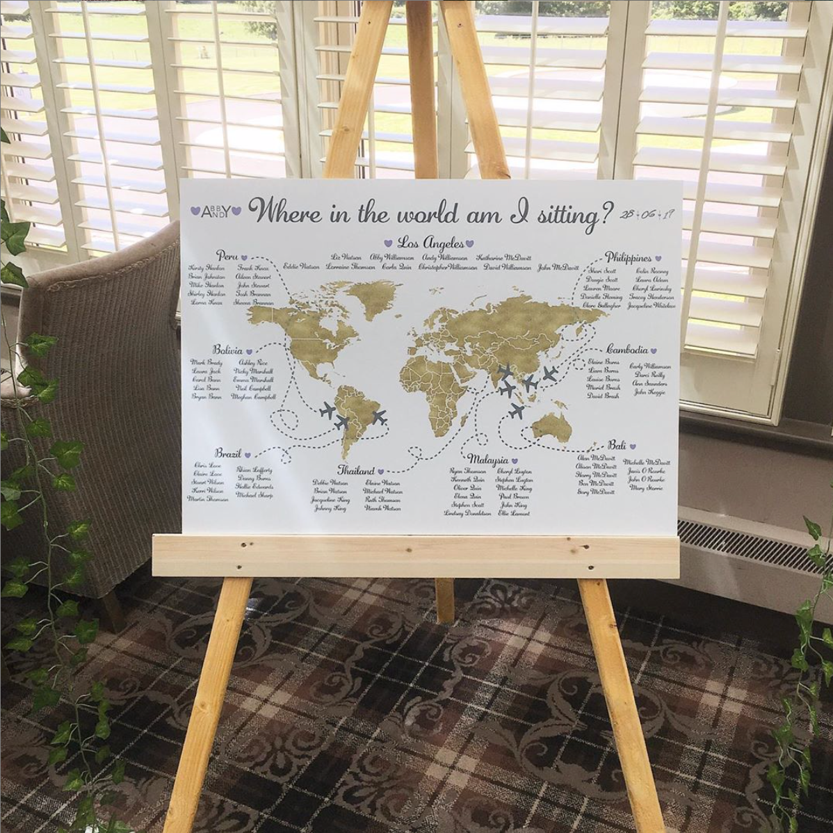 Where In The World Am I Sitting? Travel Theme Wedding Table Plan. Tables are named after places of importance to the couple, and small planes with love hearts on their wings are 'flying' to those locations. Printed A1 on 5mm thick foamex, and can be completely personalised.